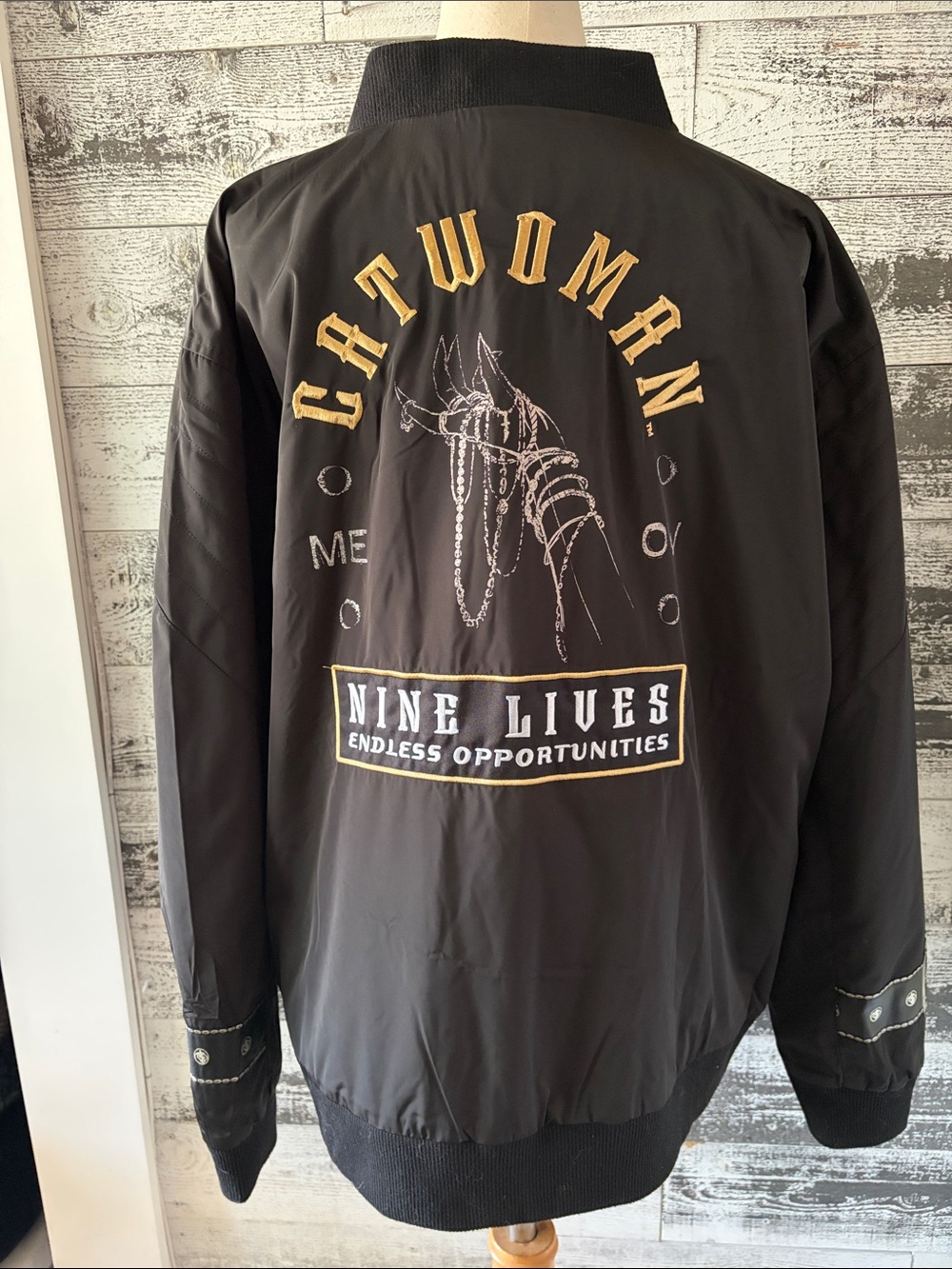 Heroes & Villains Catwoman Nine Lives Black Bomber Jacket with Graphic Back